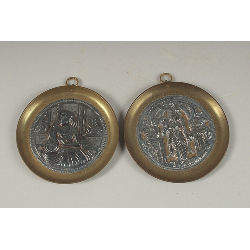 151 - A PAIR OF 19TH CENTURY INDIAN TANJORE SILVER MOUNTED BRASS DISHES, 8.5cm diameter each.