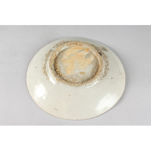 164 - A CHINESE SHIPWRECK PORCELAIN DISH, with central bird and peach design, 20.5cm diameter.