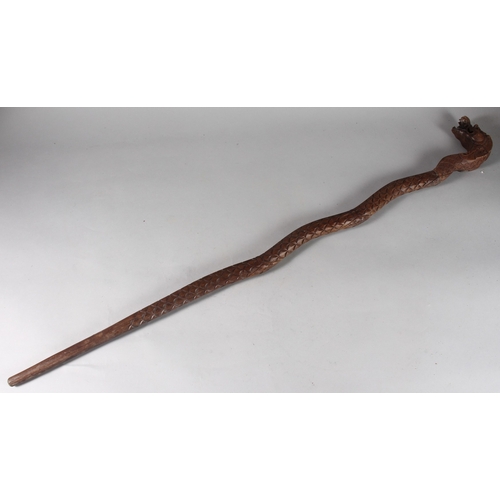 167 - A CARVED DRAGON FORM WOODEN CANE, 98cm long.