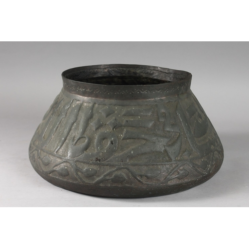 170 - AN ISLAMIC METAL BOWL WITH LARGE CALLIGRAPHY, 35cm diameter.