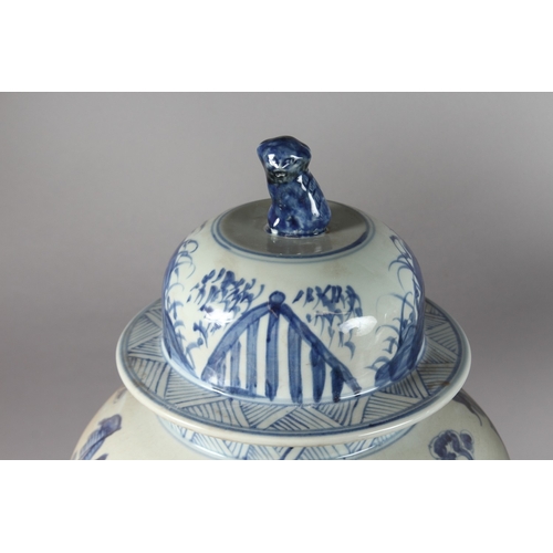 174 - A VERY LARGE PAIR OF CHINESE BLUE AND WHITE PORCELAIN JARS AND COVER, decorated with dog of fo, 52cm... 