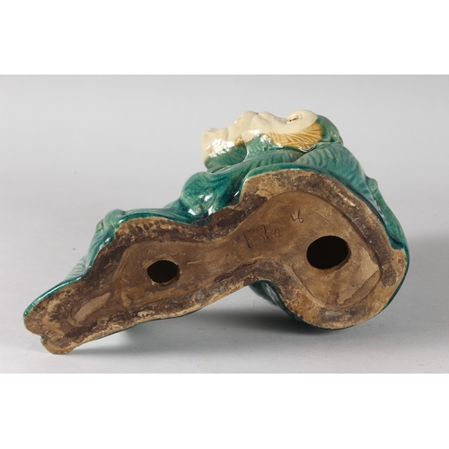 18 - A LARGE CHINESE TURQUOISE GLAZED POTTERY GROUP OF TWO MONKEYS, the base with impressed mark, 27cm lo... 