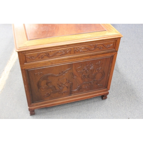 186 - A LARGE CHINESE WOODEN DESK, with openwork front panel and seven drawers, 210cm wide, 77cm high, 96c... 