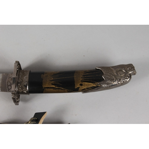 200 - A JAPANESE BLACK AND GILT LACQUER TANTO, with engraved metal mounts, together with a katana blade, (... 