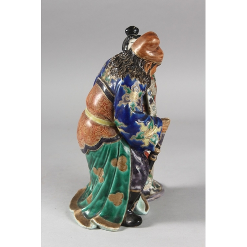 217 - A 19TH CENTURY JAPANESE KUTANI PORCELAIN FIGURAL GROUP, 25.5cm high.