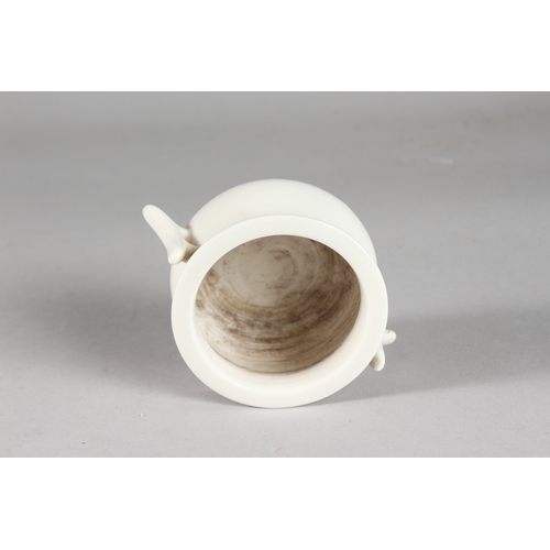 228 - A SMALL CHINESE BLANC DE CHINE TWIN HANDLE CENSER, with impressed mark to base, 12cm handle to handl... 