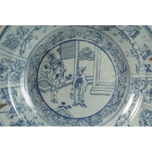 232 - A CHINESE BLUE AND WHITE PORCELAIN CHARGER DISH, painted with various scenes of figures, 32cm diamet... 