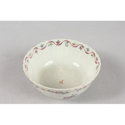 236 - AN 18TH-19TH CENTURY CHINESE FAMILLE ROSE PORCELAIN BOWL, of ribbed form with painted floral designs... 