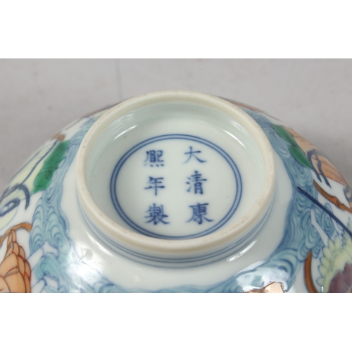 238 - A CHINESE DOUCAI ENAMELLED PORCELAIN BOWL, painted with immortals, six-character mark to base, 15.5c... 