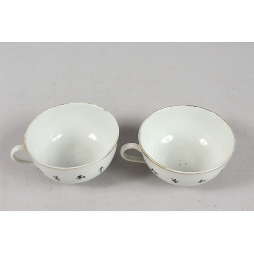 241 - A PAIR OF PORCELAIN TEACUPS.