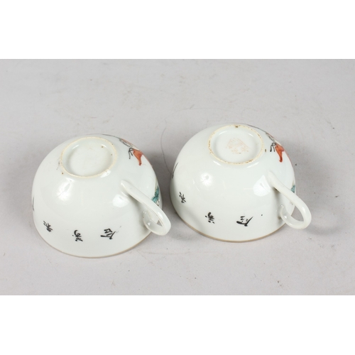 241 - A PAIR OF PORCELAIN TEACUPS.