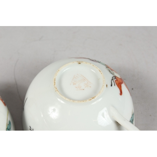 241 - A PAIR OF PORCELAIN TEACUPS.