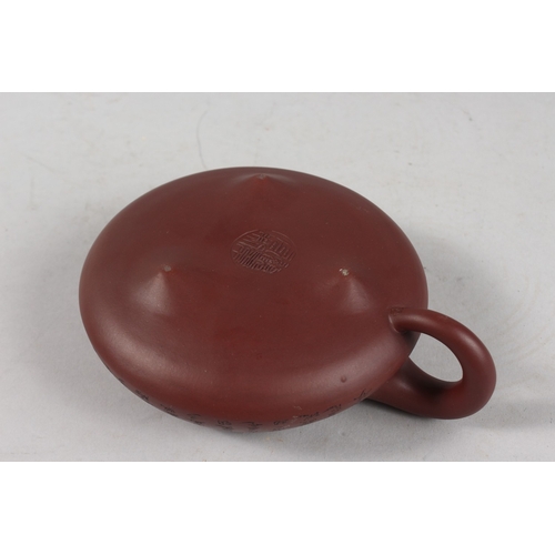 242 - A CHINESE YIXING TEAPOT.