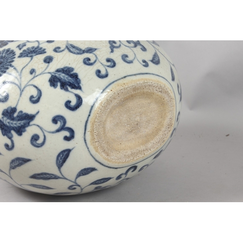 249 - A VERY LARGE CHINESE BLUE AND WHITE PORCELAIN FLORAL MOON FLASK VASE, 43cm high.