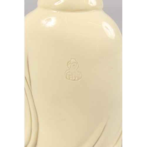 255 - A BLANC DE CHINE PORCELAIN GUANYIN, 24cm high.