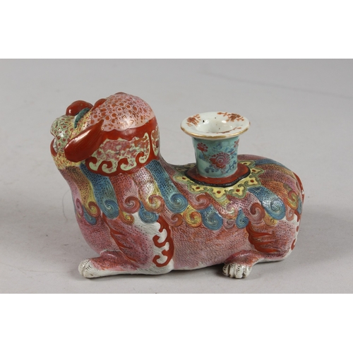 266 - A VERY FINE CHINESE FAMILLE ROSE POTTERY KYLIN CANDLE HOLDER, 18cm long.