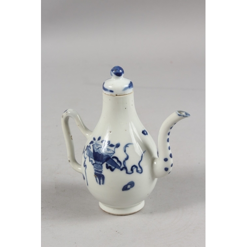 270 - AN 18TH CENTURY CHINESE BLUE AND WHITE PORCELAIN LIDDED POURER, decorated with ornaments and flowers... 