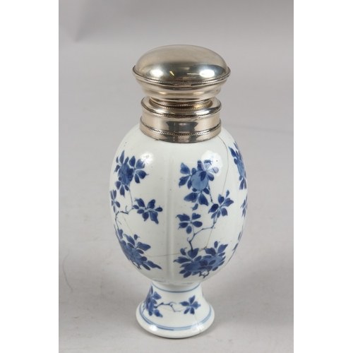 276 - A CHINESE KANGXI PERIOD SILVER MOUNTED BLUE AND WHITE PORCELAIN CADDY, with decorative floral sprays... 