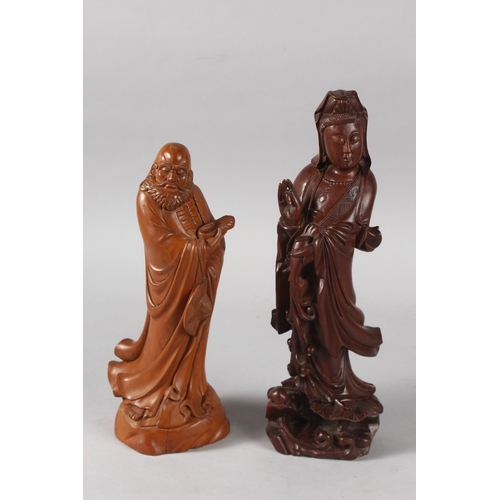 28 - TWO CHINESE CARVED WOOD FIGURES, 31.5cm and 27cm high, (2).