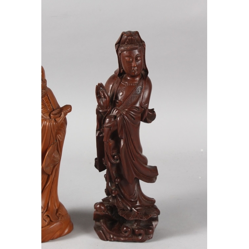 28 - TWO CHINESE CARVED WOOD FIGURES, 31.5cm and 27cm high, (2).