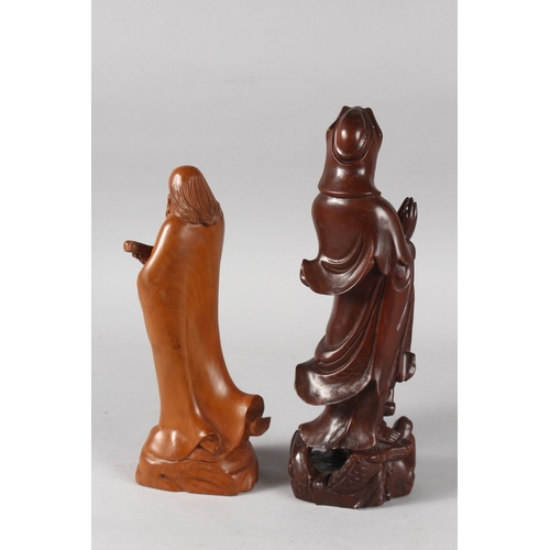 28 - TWO CHINESE CARVED WOOD FIGURES, 31.5cm and 27cm high, (2).