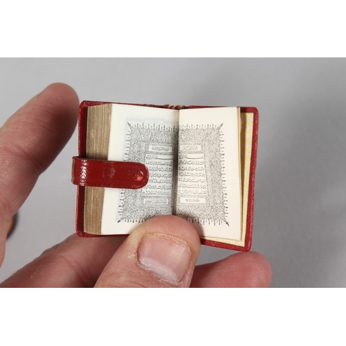 285 - A RARE 19TH-20TH CENTURY LEATHER BOUND MINIATURE QURAN, 3.8cm x 2.5cm.