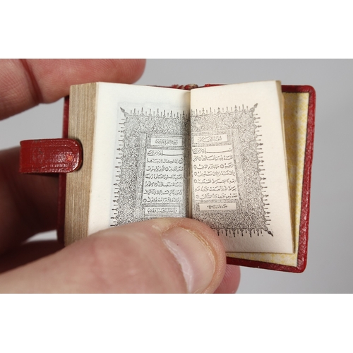 285 - A RARE 19TH-20TH CENTURY LEATHER BOUND MINIATURE QURAN, 3.8cm x 2.5cm.