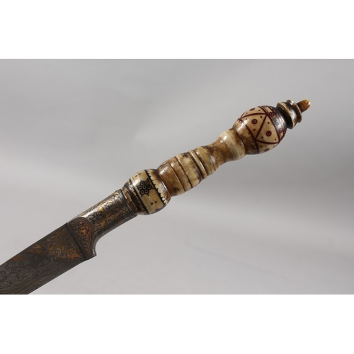 287 - A FINE INDIAN BONE HILTED SILVER AND GOLD INLAID WATERED STEEL DAGGER, 31cm long.