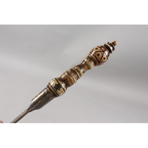 287 - A FINE INDIAN BONE HILTED SILVER AND GOLD INLAID WATERED STEEL DAGGER, 31cm long.