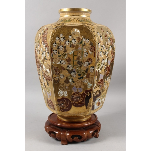 292 - A FINE AND LARGE JAPANESE KINKOZAN GILDED HEXAGONAL SATSUMA VASE ON HARDWOOD STAND, finely painted w... 