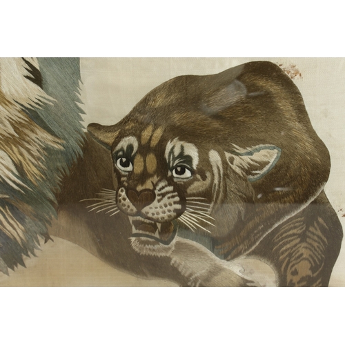 293 - A FINE AND LARGE JAPANESE EMBROIDERED SILK TEXTILE PICTURE OF A LION AND LIONESS, framed and glazed,... 