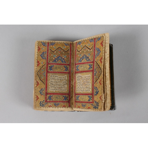 294 - A VERY FINE 19TH CENTURY PERSIAN QAJAR POCKET QURAN, with finely lacquered floral cover, the interio... 