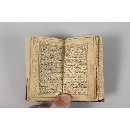 294 - A VERY FINE 19TH CENTURY PERSIAN QAJAR POCKET QURAN, with finely lacquered floral cover, the interio... 