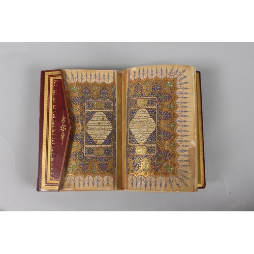 295 - A VERY FINE SMALL OTTOMAN TURKISH LEATHER BOUND QURAN, with exceptional gilded and illuminated pages... 