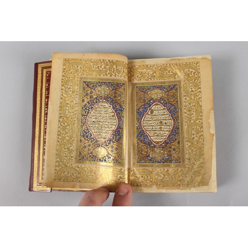 295 - A VERY FINE SMALL OTTOMAN TURKISH LEATHER BOUND QURAN, with exceptional gilded and illuminated pages... 