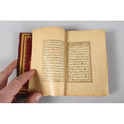 295 - A VERY FINE SMALL OTTOMAN TURKISH LEATHER BOUND QURAN, with exceptional gilded and illuminated pages... 