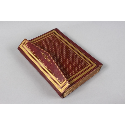 295 - A VERY FINE SMALL OTTOMAN TURKISH LEATHER BOUND QURAN, with exceptional gilded and illuminated pages... 