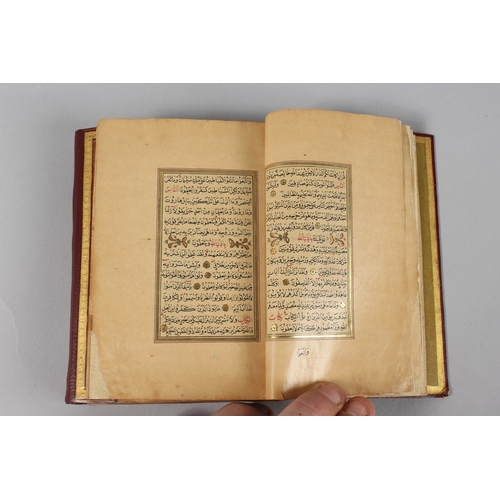 295 - A VERY FINE SMALL OTTOMAN TURKISH LEATHER BOUND QURAN, with exceptional gilded and illuminated pages... 