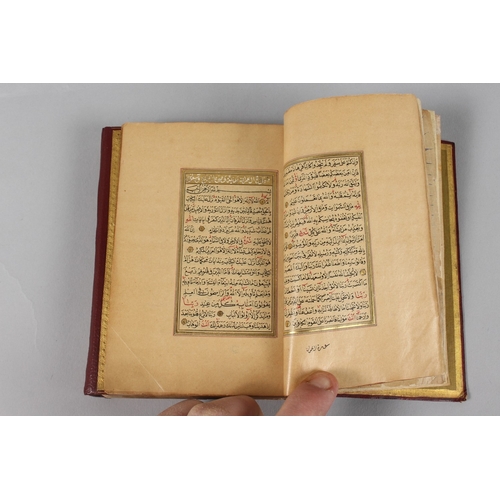 295 - A VERY FINE SMALL OTTOMAN TURKISH LEATHER BOUND QURAN, with exceptional gilded and illuminated pages... 