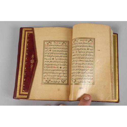 295 - A VERY FINE SMALL OTTOMAN TURKISH LEATHER BOUND QURAN, with exceptional gilded and illuminated pages... 