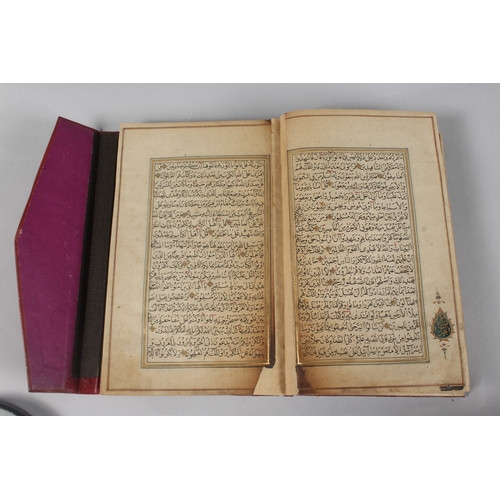 296 - A FINE PERSIAN QAJAR LEATHER BOUND QURAN, with embossed cover and finely gilded illuminated pages, d... 