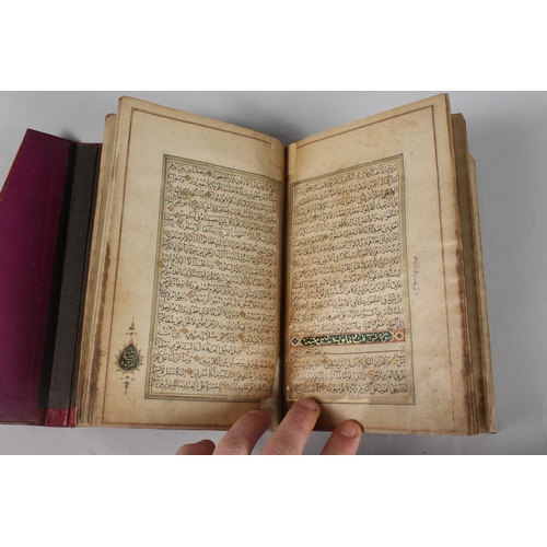 296 - A FINE PERSIAN QAJAR LEATHER BOUND QURAN, with embossed cover and finely gilded illuminated pages, d... 