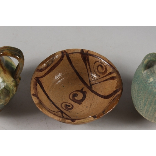 297 - THREE PIECES OF SYRIAN RAQQA POTTERY; vase, bowl and ewer, (3).