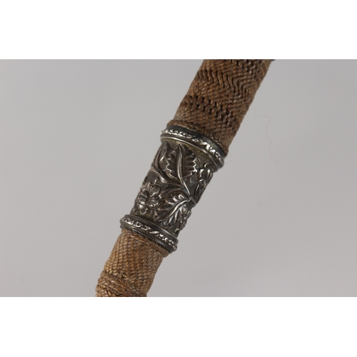 301 - A 19TH CENTURY INDIAN WHIP, mounted with engraved silver bands, 52cm long.