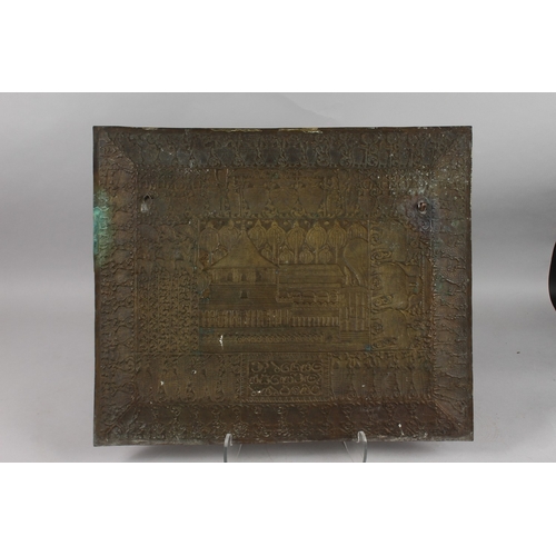 303 - A LARGE INDIAN EMBOSSED AND CHASED BRASS RECTANGULAR TRAY, 51cm x 61cm.