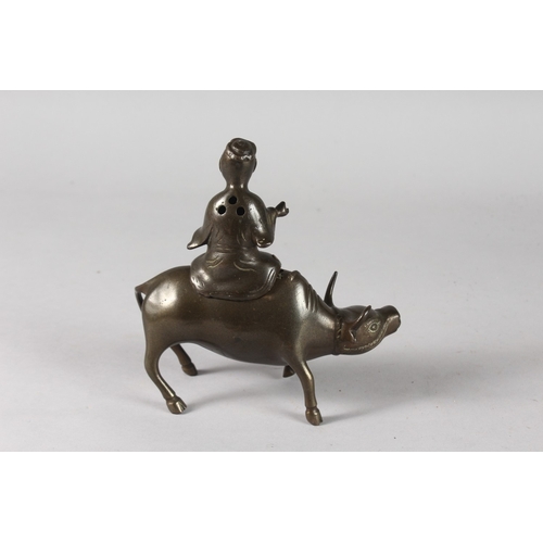 31 - A CHINESE BRONZE INCENSE BURNER FORMED AS A BOY AND WATER BUFFALO, 15cm long.