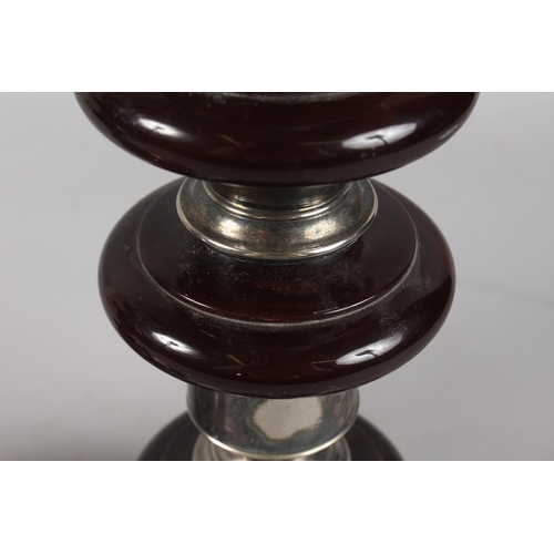 315 - A VERY FINE PAIR OF CIRCULAR PLATED TABLE LAMP BASES, the columns inserted with possibly bakelite or... 