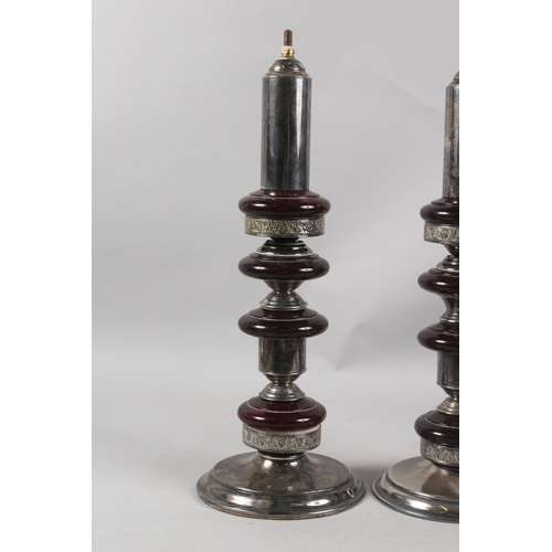 315 - A VERY FINE PAIR OF CIRCULAR PLATED TABLE LAMP BASES, the columns inserted with possibly bakelite or... 