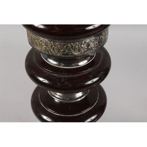 315 - A VERY FINE PAIR OF CIRCULAR PLATED TABLE LAMP BASES, the columns inserted with possibly bakelite or... 