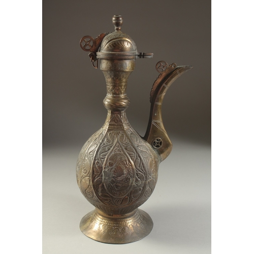 318 - A FINE INDIAN BRASS EWER, with embossed and chased fish decoration, 40cm high.